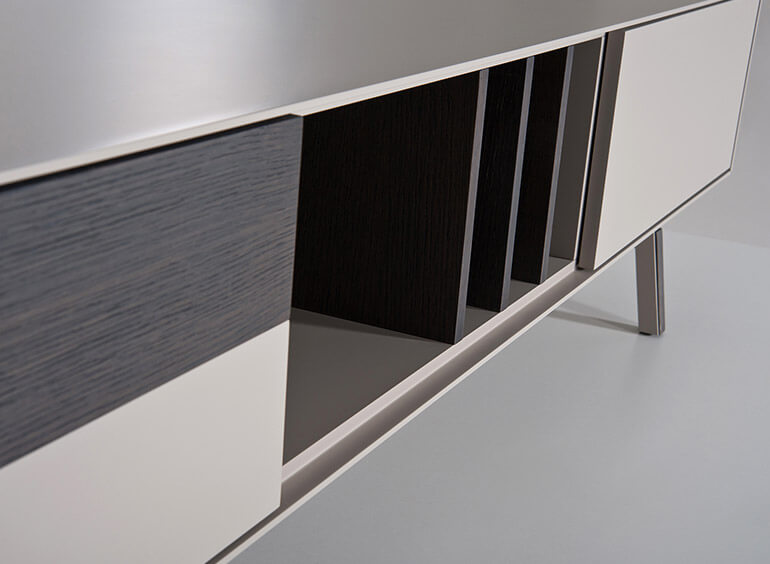 Detail of the vertical partitions in dark oak. vintme tv unit